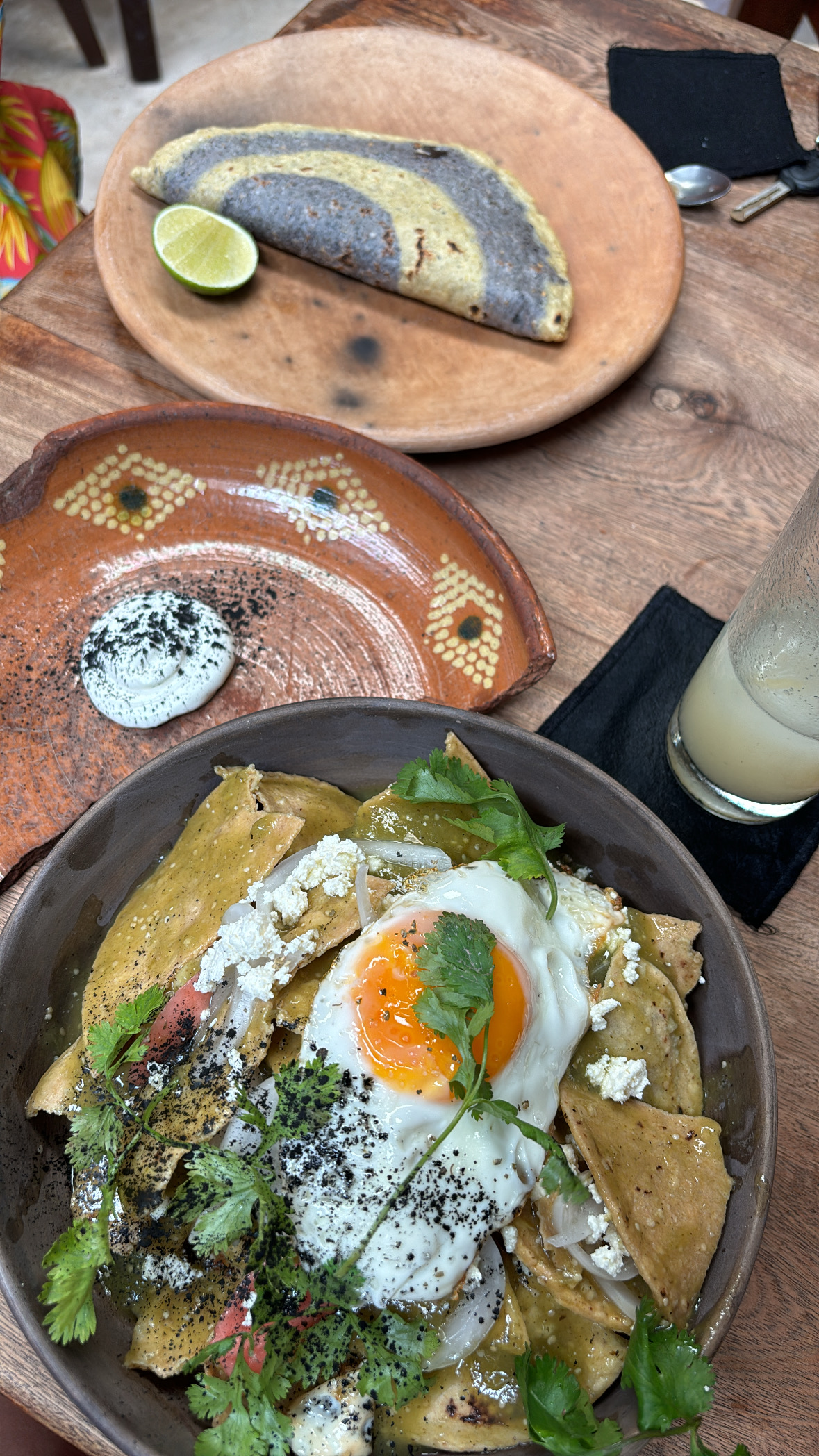 Chilaquiles and huitlacoche taco at a sit-down Tulum restaurant